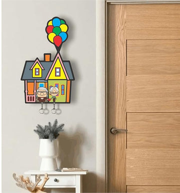 UP Movie inspired wooden wall key holder with matching keychain mounted near door