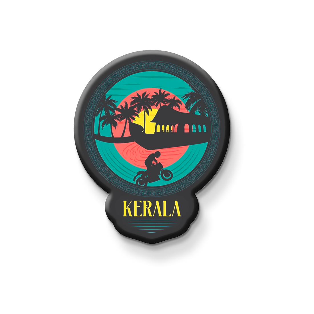 Decorative fridge magnet with 'Kerala' design on a metallic surface