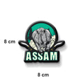 Magnet with a rhinoceros design and 'Assam' text on a white background