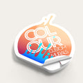 Custom die-cut vinyl stickers with a glossy gradient finish, stacked